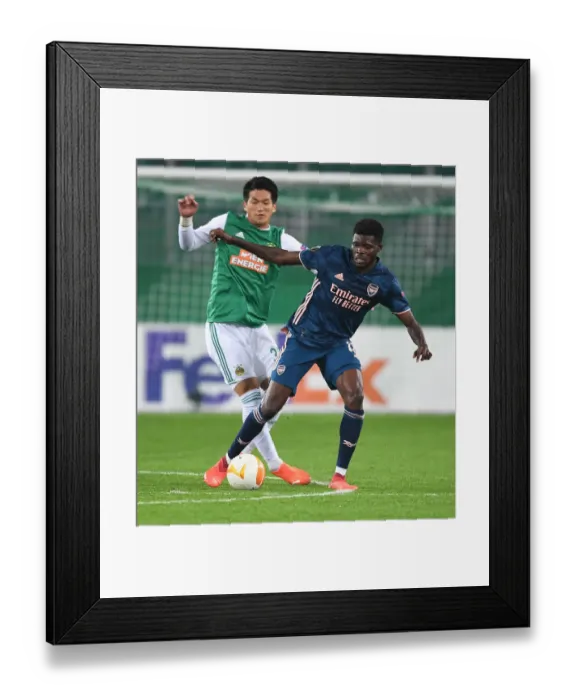 Framed Print : Thomas Partey Scores Past Rapid Wien: Arsenal's Europa League Triumph in Vienna