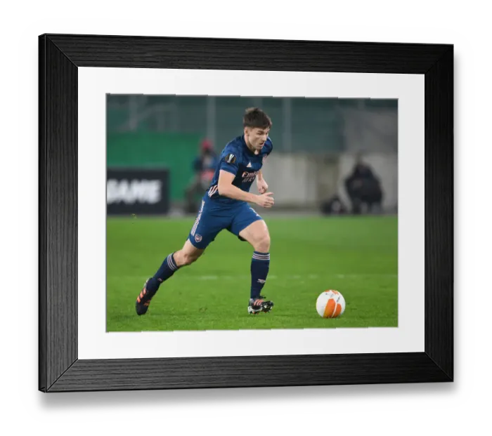 Framed Print : Arsenal's Kieran Tierney in Action against Rapid Vienna in UEFA Europa League