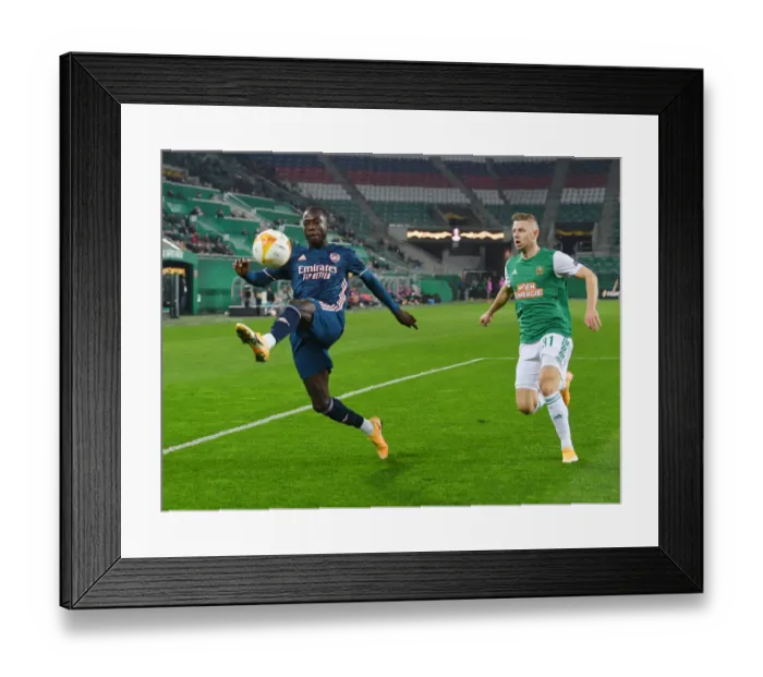 Framed Print : Nicolas Pepe in Action: Arsenal vs Rapid Vienna, UEFA Europa League 2020-21