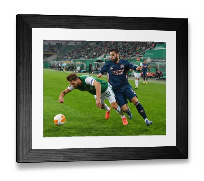 Framed Print : Sead Kolasinac vs. Maximilian Hofmann: Clash in the Europa League between Rapid Vienna and Arsenal FC