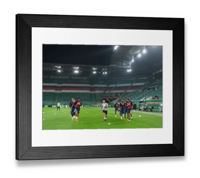Framed Print : Arsenal FC Warm-Up Ahead of Rapid Wien Clash in Europa League Framed Print : Arsenal FC Warm-Up Ahead of Rapid Wien Clash in Europa League