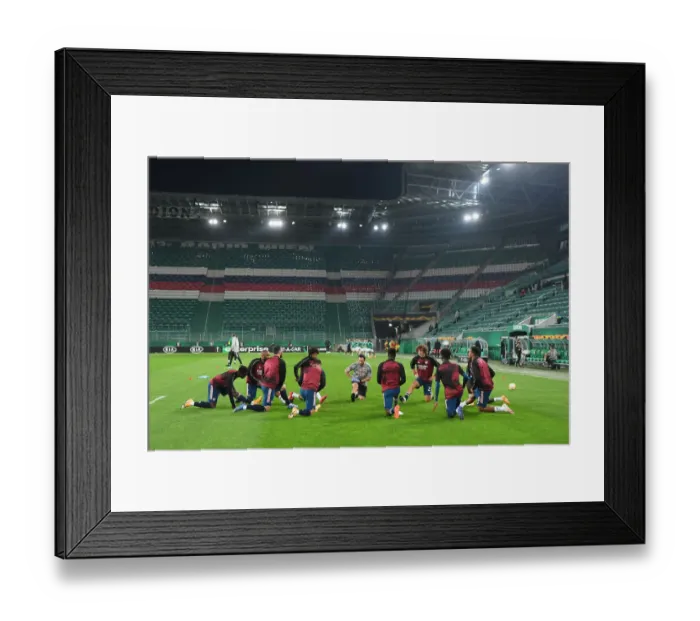 Framed Print : Arsenal FC Prepares for Europa League Clash against Rapid Vienna