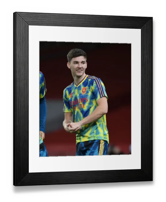 Framed Print : Arsenal's Kieran Tierney: Pre-Match Focus at Empty Emirates Stadium vs Leicester City (2020-21) Framed Print : Arsenal's Kieran Tierney: Pre-Match Focus at Empty Emirates Stadium vs Leicester City (2020-21)