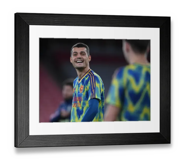 Framed Print : Granit Xhaka's Pre-Match Focus: Arsenal vs Leicester City at Empty Emirates Stadium (2020-21) Framed Print : Granit Xhaka's Pre-Match Focus: Arsenal vs Leicester City at Empty Emirates Stadium (2020-21)