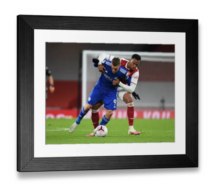 Framed Print : Gabriel vs Vardy: A Battle at Empty Emirates - Premier League 2020-21: Arsenal vs Leicester City Framed Print : Gabriel vs Vardy: A Battle at Empty Emirates - Premier League 2020-21: Arsenal vs Leicester City