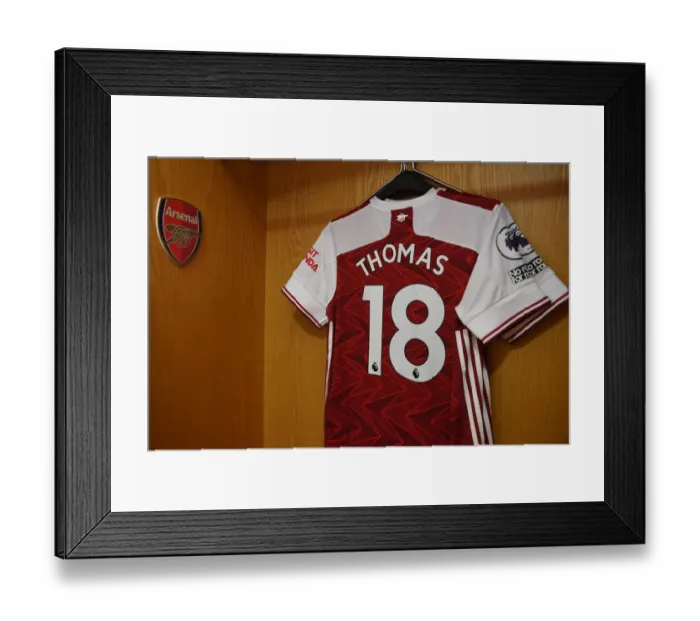 Framed Print : Thomas Partey's Empty Arsenal Shirt: A Silent Emirates Stadium for Arsenal vs Leicester City (2020-21)