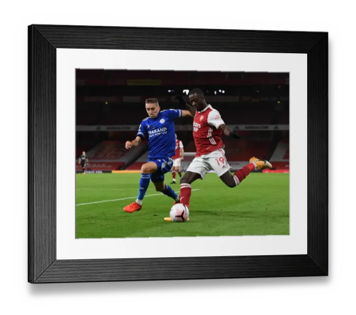 Framed Print : Arsenal vs Leicester City: Pepe vs Castagne in Empty Emirates Stadium, Premier League 2020-21 Framed Print : Arsenal vs Leicester City: Pepe vs Castagne in Empty Emirates Stadium, Premier League 2020-21