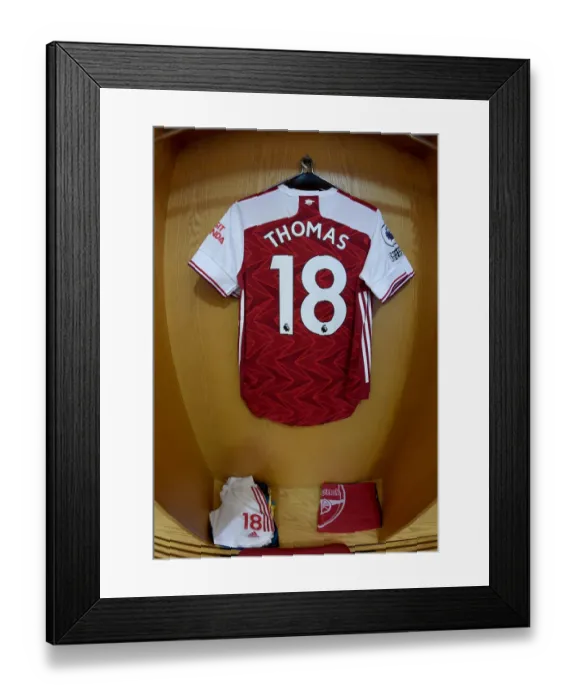 Framed Print : Arsenal's Empty Emirates: Thomas Partey's Hanging Shirt in the Silent Arena (Arsenal v Leicester City, 2020-21)