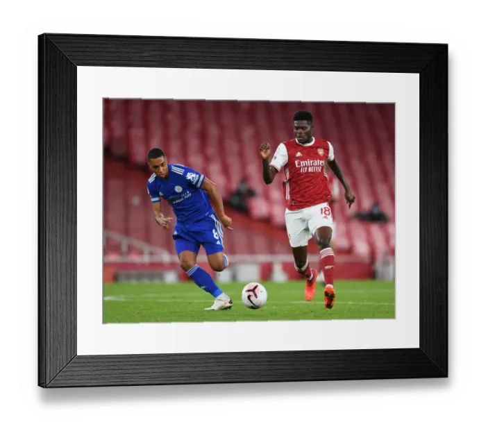 Framed Print : Clash of Midfield Titans: Partey vs Tielemans - Arsenal vs Leicester City, Premier League 2020-21 (Empty Emirates Stadium)