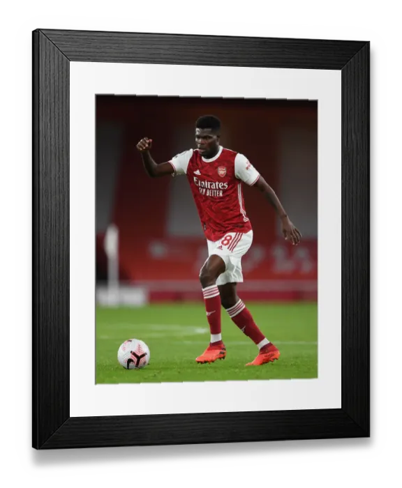 Framed Print : Arsenal vs Leicester City: Thomas Partey in Action at Empty Emirates Stadium, Premier League 2020-21 Framed Print : Arsenal vs Leicester City: Thomas Partey in Action at Empty Emirates Stadium, Premier League 2020-21