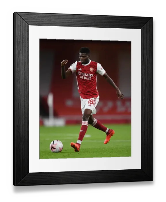 Framed Print : Thomas Partey in Action: Arsenal vs Leicester City, Premier League 2020-21 (Behind Closed Doors) Framed Print : Thomas Partey in Action: Arsenal vs Leicester City, Premier League 2020-21 (Behind Closed Doors)