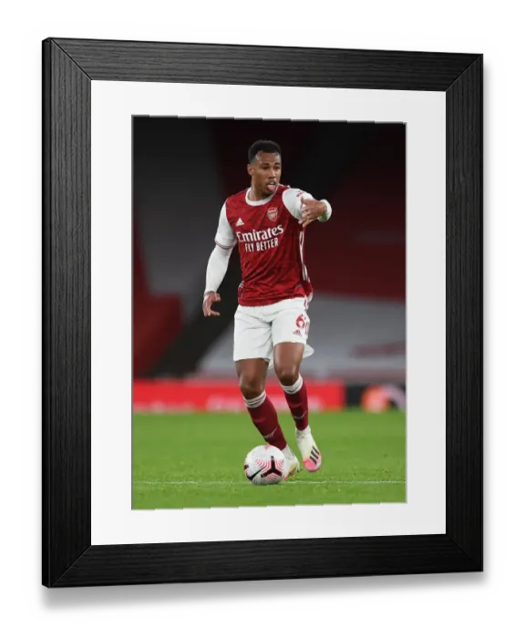 Framed Print : Arsenal's Gabriel Magalhaes in Action at Emirates Stadium (2020-21) - Arsenal vs Leicester City: Behind Closed Doors