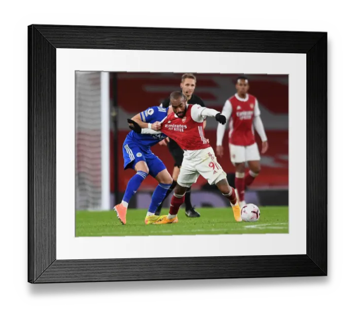 Framed Print : Arsenal vs Leicester: Lacazette Holds Off Madison Amid Empty Emirates Framed Print : Arsenal vs Leicester: Lacazette Holds Off Madison Amid Empty Emirates