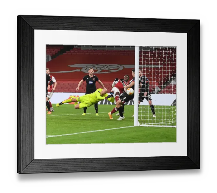 Framed Print : Eddie Nketiah Scores First Goal at Empty Emirates Stadium in Europa League Match Against Dundalk Framed Print : Eddie Nketiah Scores First Goal at Empty Emirates Stadium in Europa League Match Against Dundalk