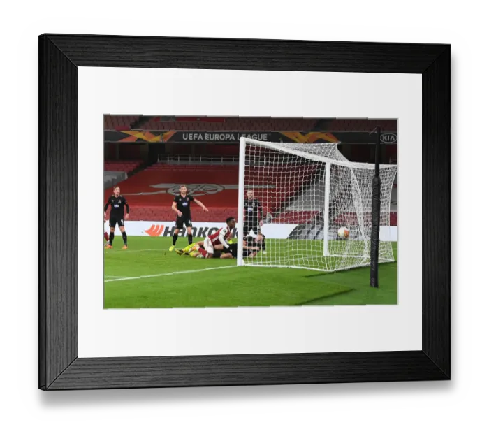 Framed Print : Eddie Nketiah Scores First Europa League Goal for Arsenal: Emirates Victory Amidst Empty Stands (2020-21) Framed Print : Eddie Nketiah Scores First Europa League Goal for Arsenal: Emirates Victory Amidst Empty Stands (2020-21)