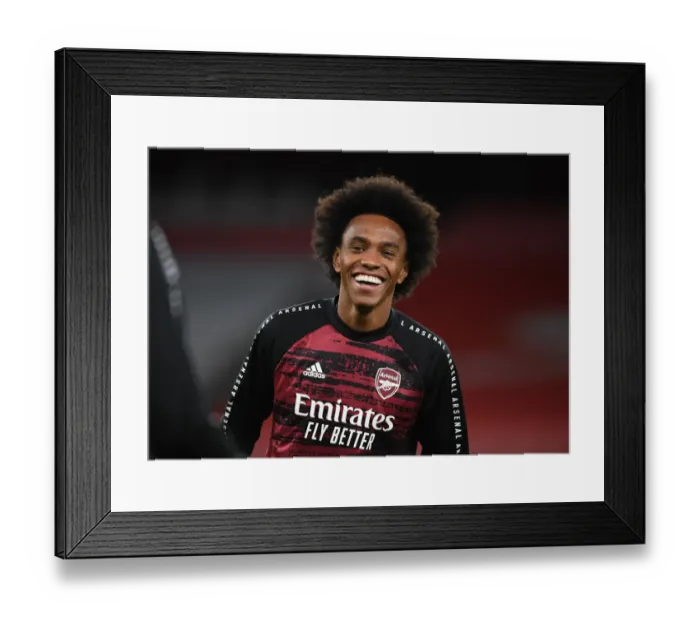 Framed Print : Arsenal's Willian Prepares for Europa League Clash Against Dundalk Amid Empty Emirates Stadium