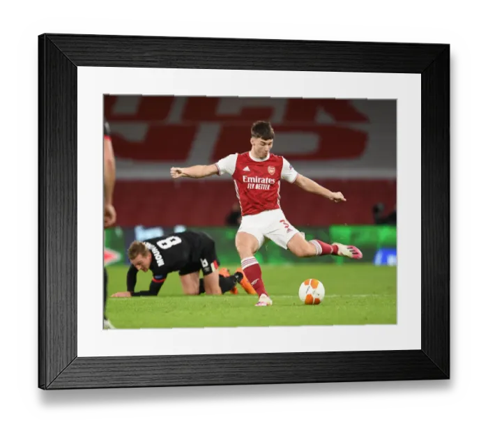 Framed Print : Arsenal's Kieran Tierney in UEFA Europa League Action Against Dundalk Amidst Empty Emirates Stadium