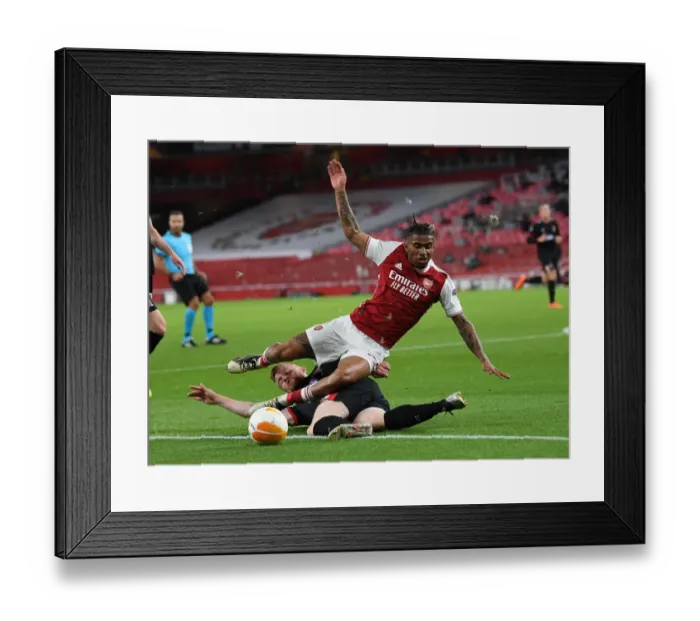 Framed Print : Arsenal vs Dundalk: Emirates Stadium Battle in Empty UEFA Europa League Match Framed Print : Arsenal vs Dundalk: Emirates Stadium Battle in Empty UEFA Europa League Match