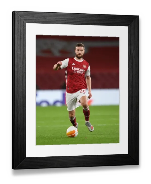 Framed Print : Arsenal's Mustafi in UEFA Europa League: A Lone Figure at Empty Emirates Stadium Framed Print : Arsenal's Mustafi in UEFA Europa League: A Lone Figure at Empty Emirates Stadium