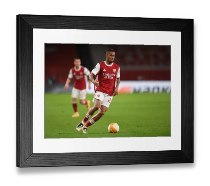 Framed Print : Arsenal vs Dundalk: Emirates Stadium Showdown in Empty Europa League Atmosphere
