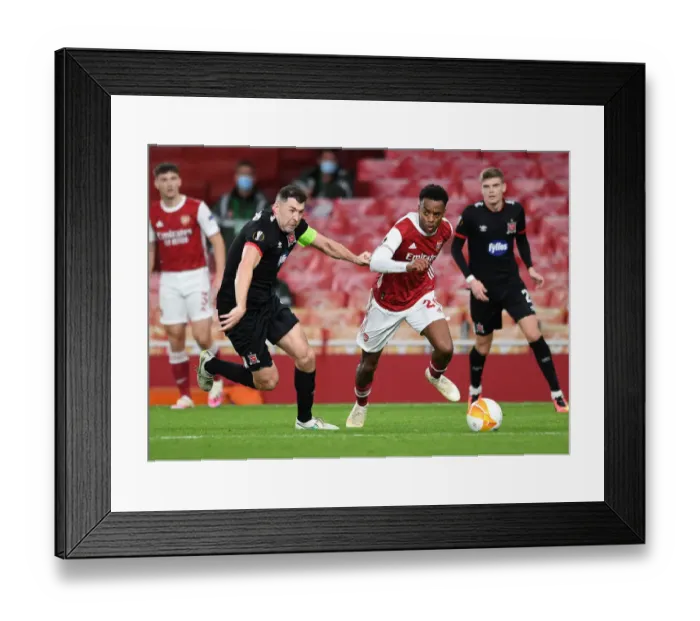 Framed Print : Arsenal's Joe Willock Clashes with Dundalk's Christopher Shields in Empty Emirates Stadium - UEFA Europa League 2020-21 Framed Print : Arsenal's Joe Willock Clashes with Dundalk's Christopher Shields in Empty Emirates Stadium - UEFA Europa League 2020-21