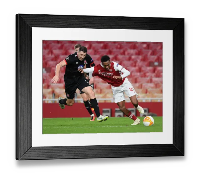 Framed Print : Arsenal vs Dundalk: Joe Willock Clashes with Christopher Shields in Empty Emirates Stadium - UEFA Europa League 2020-21 Framed Print : Arsenal vs Dundalk: Joe Willock Clashes with Christopher Shields in Empty Emirates Stadium - UEFA Europa League 2020-21