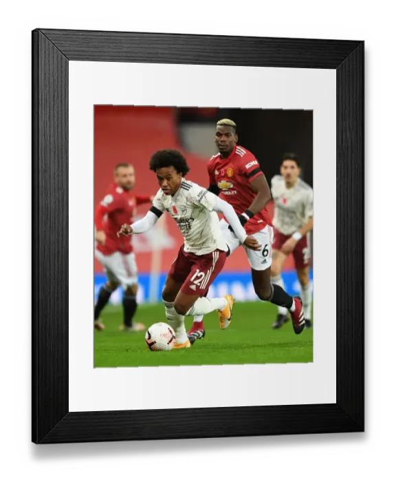 Framed Print : Willian vs. Pogba: A Battle in Empty Old Trafford - Premier League 2020-21: Arsenal's Willian Clashes with Manchester United's Pogba in Ghostly Atmosphere of Old Trafford Framed Print : Willian vs. Pogba: A Battle in Empty Old Trafford - Premier League 2020-21: Arsenal's Willian Clashes with Manchester United's Pogba in Ghostly Atmosphere of Old Trafford