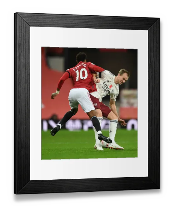 Framed Print : Rousing Rivalry: Holding vs. Rashford - A Premier League Battle at Empty Old Trafford (Manchester United vs. Arsenal, 2020-21)