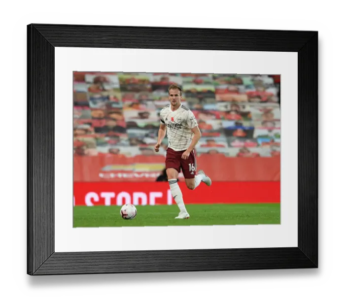 Framed Print : Arsenal's Rob Holding at Empty Old Trafford: 2020-21 Premier League Match (Manchester United vs Arsenal) Framed Print : Arsenal's Rob Holding at Empty Old Trafford: 2020-21 Premier League Match (Manchester United vs Arsenal)