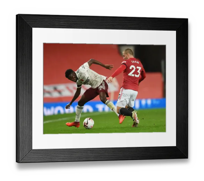Framed Print : Partey vs. Shaw: Manchester United vs. Arsenal Clash in Empty Old Trafford, Premier League 2020-21 Framed Print : Partey vs. Shaw: Manchester United vs. Arsenal Clash in Empty Old Trafford, Premier League 2020-21