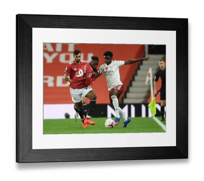 Framed Print : Saka vs. Wan-Bissaka: Empty Old Trafford Battle - Premier League 2020-21 Showdown Framed Print : Saka vs. Wan-Bissaka: Empty Old Trafford Battle - Premier League 2020-21 Showdown
