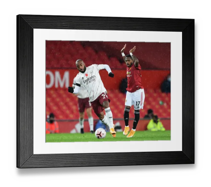 Framed Print : Manchester United vs Arsenal: Lacazette vs Fred in Empty Old Trafford - Premier League 2020-21 Framed Print : Manchester United vs Arsenal: Lacazette vs Fred in Empty Old Trafford - Premier League 2020-21