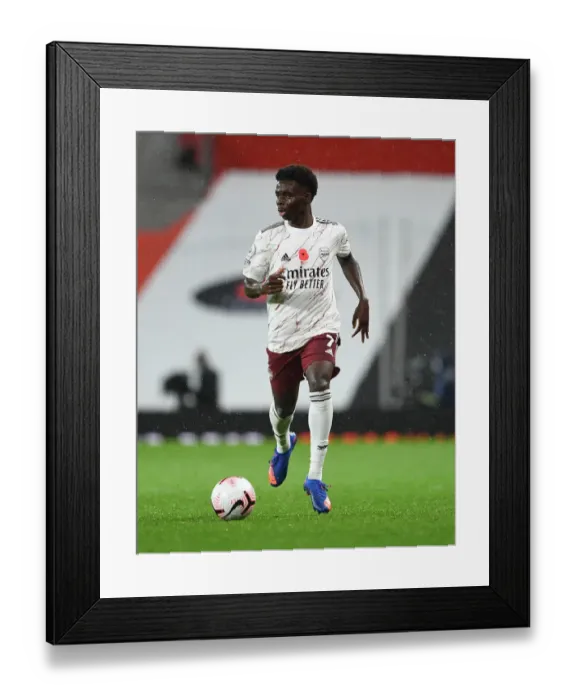 Framed Print : Behind Closed Doors: Bukayo Saka in Action - Manchester United vs Arsenal, Premier League 2020-21 Framed Print : Behind Closed Doors: Bukayo Saka in Action - Manchester United vs Arsenal, Premier League 2020-21