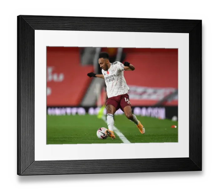 Framed Print : Arsenal's Aubameyang Faces Manchester United in Empty Old Trafford (2020-21 Premier League) Framed Print : Arsenal's Aubameyang Faces Manchester United in Empty Old Trafford (2020-21 Premier League)