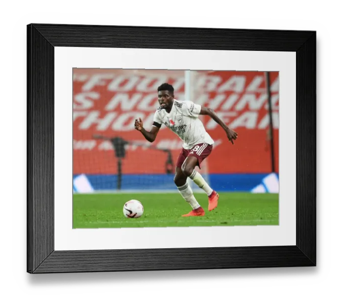 Framed Print : Thomas Partey in Action: 2020-21 Premier League - Manchester United vs. Arsenal (Behind Closed Doors)