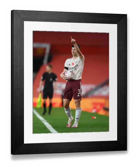 Framed Print : Arsenal's Kieran Tierney Faces Manchester United in Empty Old Trafford Amidst COVID-19 Restrictions: 2020-21 Premier League Showdown