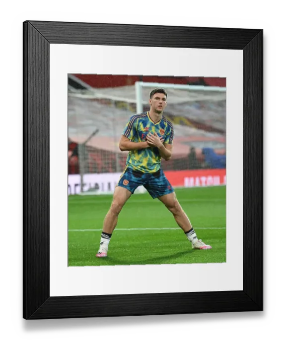 Framed Print : Arsenal's Kieran Tierney Prepares for Manchester United Clash in Empty Old Trafford (2020-21 Premier League) Framed Print : Arsenal's Kieran Tierney Prepares for Manchester United Clash in Empty Old Trafford (2020-21 Premier League)