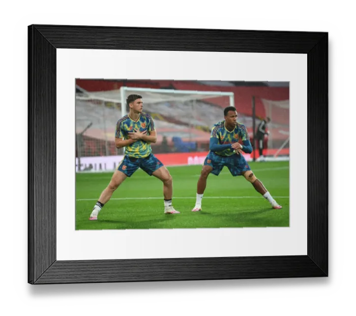 Framed Print : Arsenal Players Kieran Tierney and Gabriel Magalhaes Warm Up Ahead of Manchester United Clash (2020-21 Premier League) Framed Print : Arsenal Players Kieran Tierney and Gabriel Magalhaes Warm Up Ahead of Manchester United Clash (2020-21 Premier League)