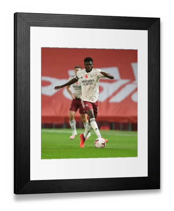 Framed Print : Thomas Partey in Action: Manchester United vs. Arsenal, 2020-21 Premier League - Behind Closed Doors