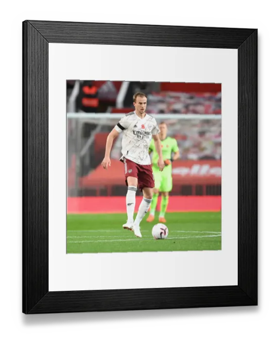 Framed Print : Arsenal's Rob Holding at Empty Old Trafford: 2020-21 Premier League Match (Manchester United vs Arsenal) Framed Print : Arsenal's Rob Holding at Empty Old Trafford: 2020-21 Premier League Match (Manchester United vs Arsenal)
