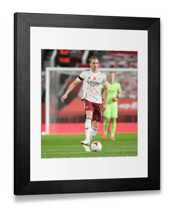 Framed Print : Behind Closed Doors: Rob Holding at Old Trafford - Manchester United vs Arsenal, 2020-21 Premier League