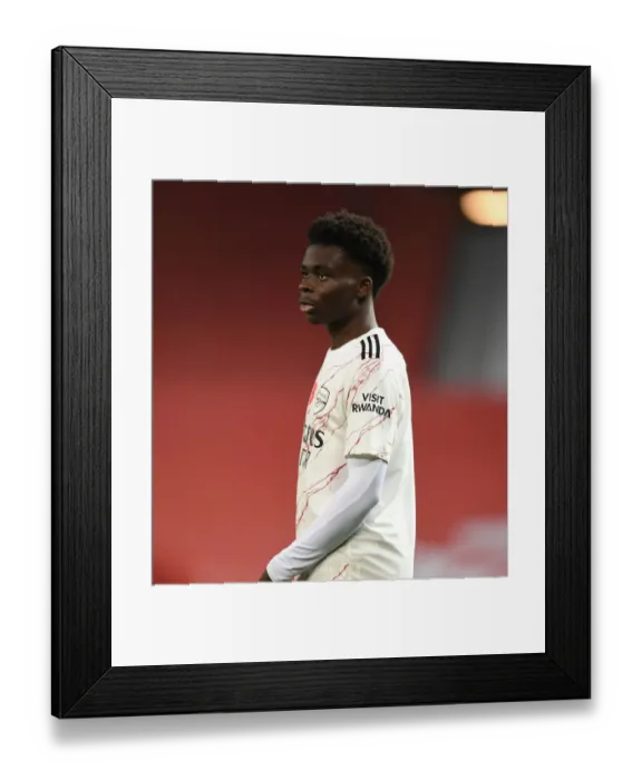 Framed Print : Lone Warrior Saka: Arsenal's Standout Performance at Empty Old Trafford in the 2020-21 Manchester United Showdown Framed Print : Lone Warrior Saka: Arsenal's Standout Performance at Empty Old Trafford in the 2020-21 Manchester United Showdown