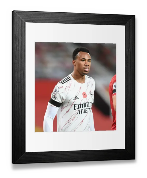 Framed Print : Arsenal's Gabriel Faces Manchester United in Empty Old Trafford (Manchester United vs Arsenal, 2020-21) Framed Print : Arsenal's Gabriel Faces Manchester United in Empty Old Trafford (Manchester United vs Arsenal, 2020-21)