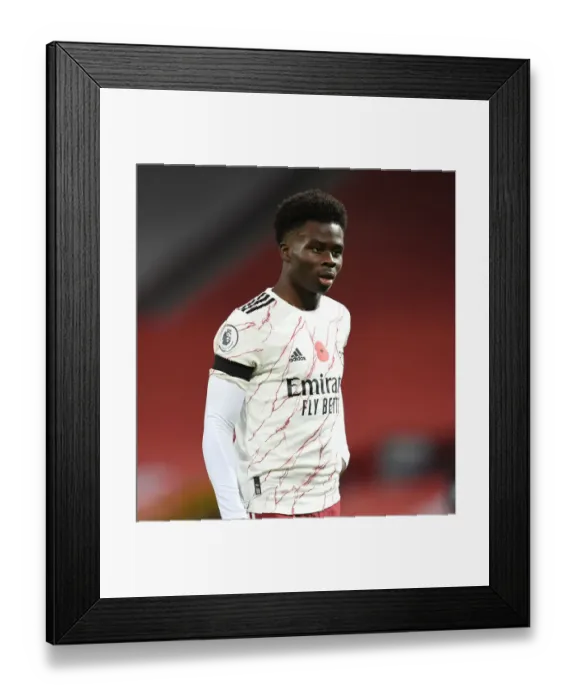 Framed Print : Behind Closed Doors: Bukayo Saka Shines for Arsenal against Manchester United (Premier League 2020-21) Framed Print : Behind Closed Doors: Bukayo Saka Shines for Arsenal against Manchester United (Premier League 2020-21)