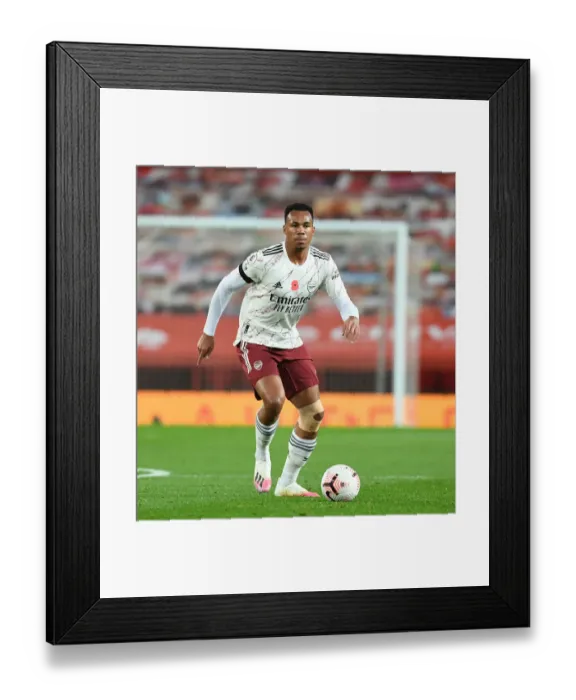 Framed Print : Arsenal's Gabriel Faces Empty Old Trafford in Premier League 2020-21: Manchester United vs Arsenal