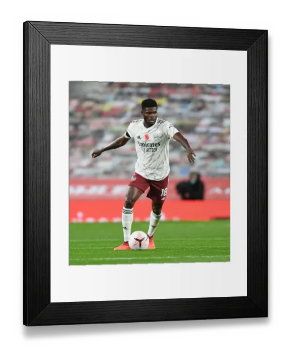 Framed Print : Thomas Partey in Action: Arsenal vs Manchester United, 2020-21 Premier League (Behind Closed Doors)