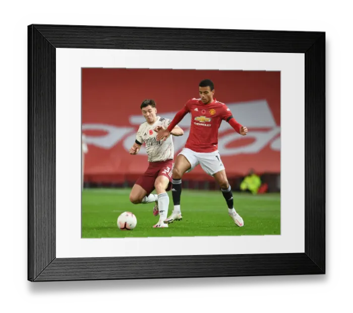 Framed Print : Manchester United vs Arsenal: Premier League Clash Amidst Empty Stands (2020-21) Framed Print : Manchester United vs Arsenal: Premier League Clash Amidst Empty Stands (2020-21)