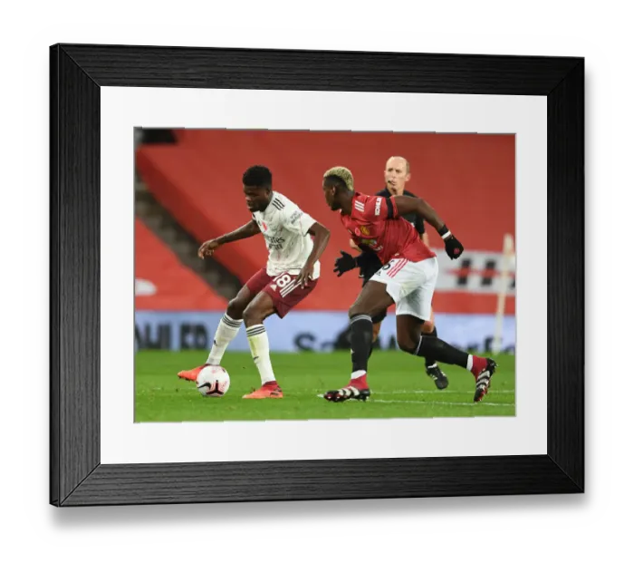 Framed Print : Arsenal vs Manchester United: 2020-21 Premier League Clash at Old Trafford - Behind Closed Doors Framed Print : Arsenal vs Manchester United: 2020-21 Premier League Clash at Old Trafford - Behind Closed Doors