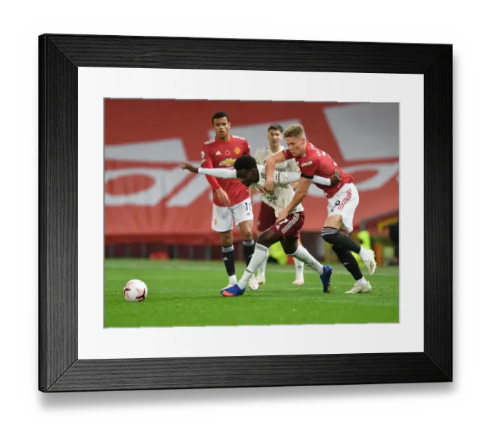 Framed Print : Arsenal vs Manchester United: 2020-21 Premier League Clash at Old Trafford - Behind Closed Doors Framed Print : Arsenal vs Manchester United: 2020-21 Premier League Clash at Old Trafford - Behind Closed Doors