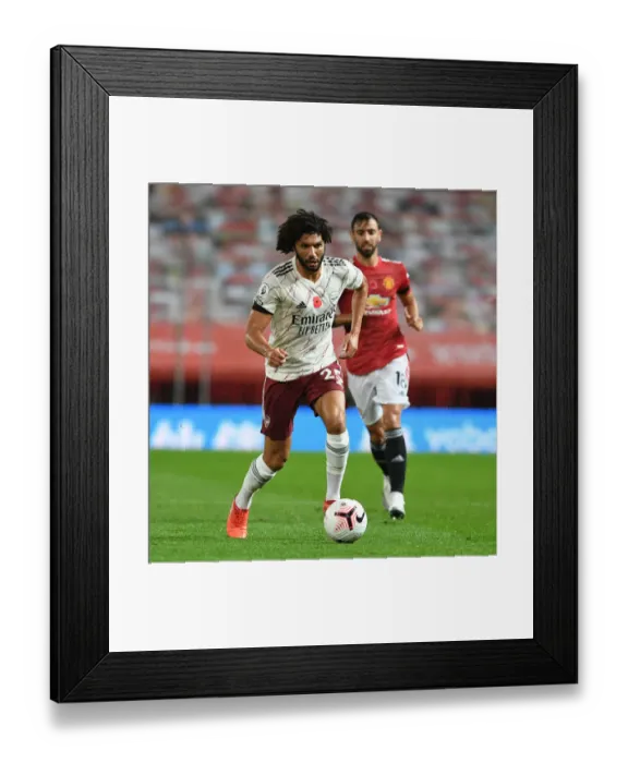 Framed Print : Arsenal's Mo Elneny at Empty Old Trafford: 2020-21 Premier League Clash Between Manchester United and Arsenal